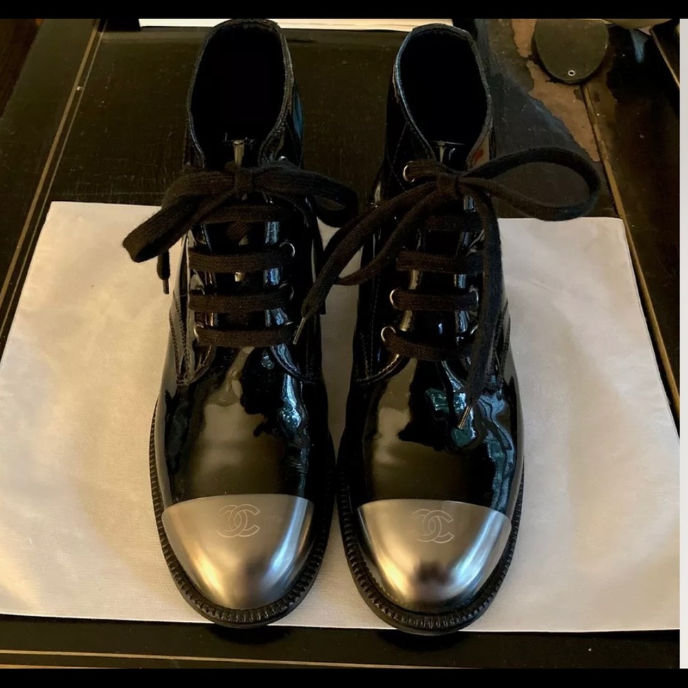 Like new preowned Chanel boots. Metal cap toe. Patent leather
